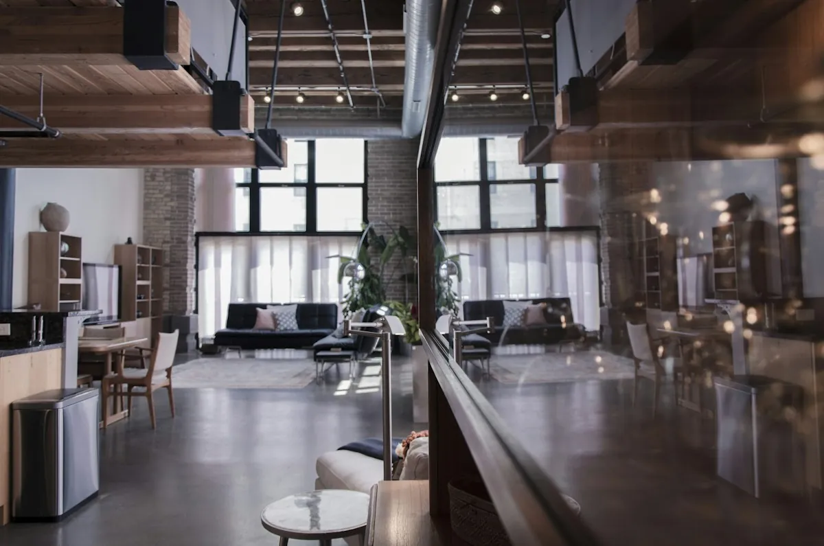 Spacious loft with large windows and stylish furniture